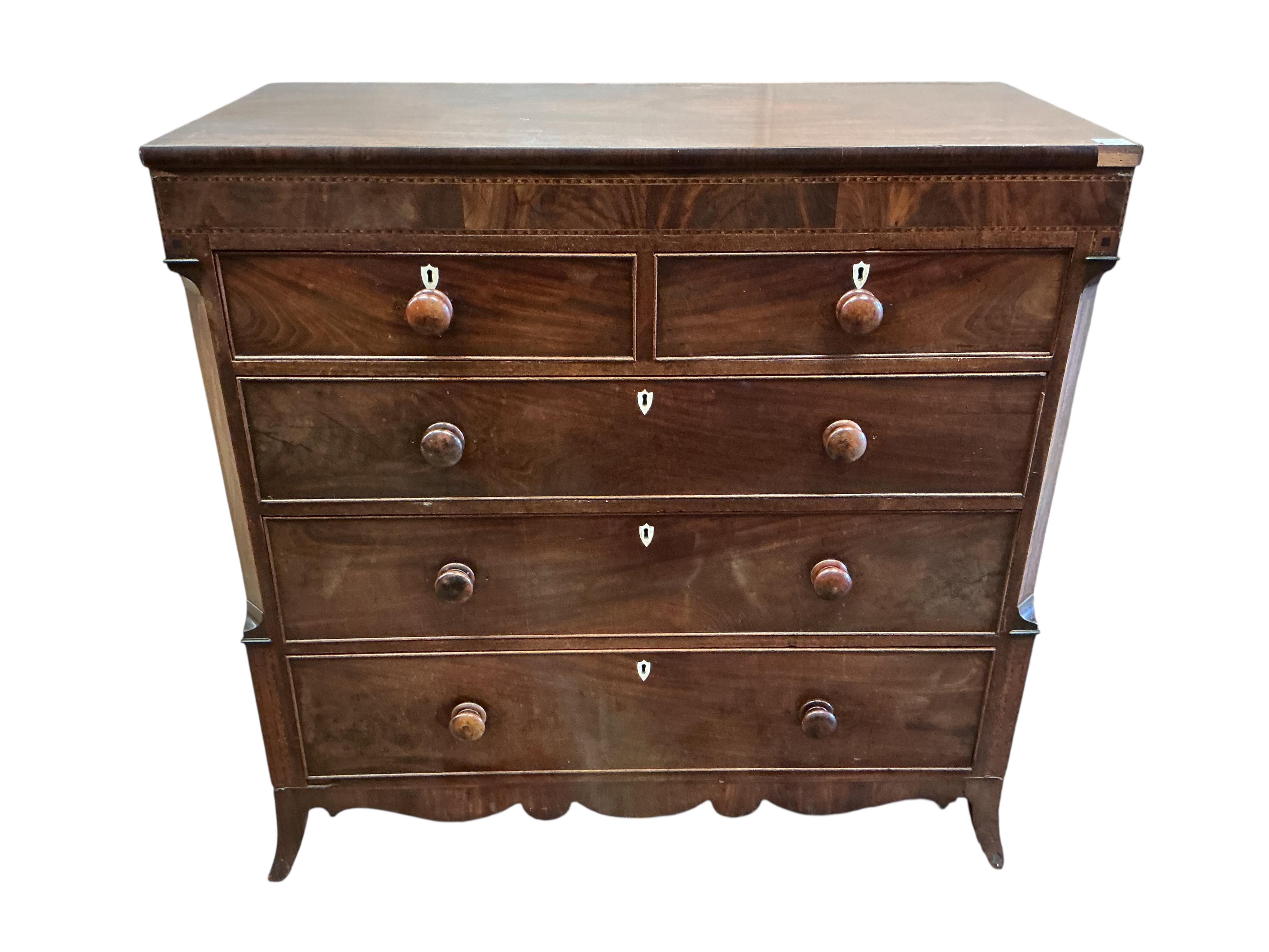 A George IV mahogany chest of drawers with bone escutcheons, width 122cm, depth 56cm, height 121cm